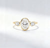 3.00 ct Oval Lab Grown Diamond Three-Stone Bezel Ring  with Pear Side Stones