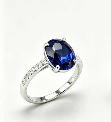 Atelier Gemstone 3.50 Carat Oval Cut Lab Grown Blue Sapphire 4-Prong Solitaire Ring with Diamond Pavé 925 Sterling Silver (18K Gold Plated)