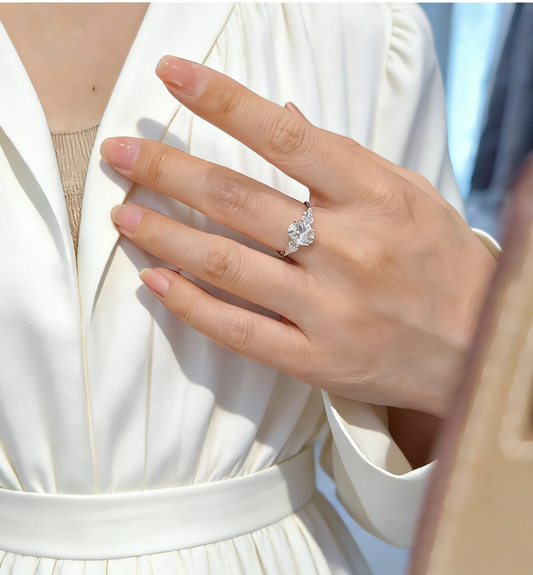 2.50 ct Oval Lab Grown Diamond Three-Stone Ring  with Pear Side Stones