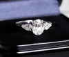 2.50 ct Oval Lab Grown Diamond Three-Stone Ring  with Pear Side Stones