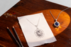 5.50ct Royal Blue Sapphire and Lab Grown Diamond Halo Pendant Necklace