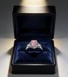 1.50 ct Pear Lab Grown Pink Diamond Three-Stone Ring with Trapezoid Side Stones