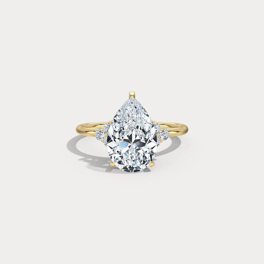 3CT Pear Cut Lab Grown Diamond Cluster Ring with Round Accents in 10K Gold/Platinum