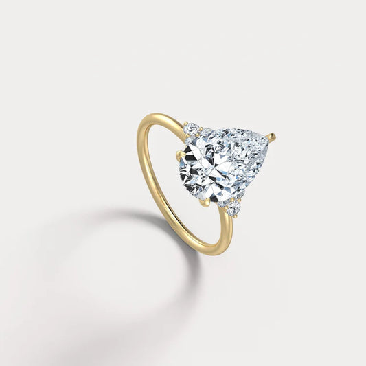 3CT Pear Cut Lab Grown Diamond Cluster Ring with Round Accents in 10K Gold/Platinum