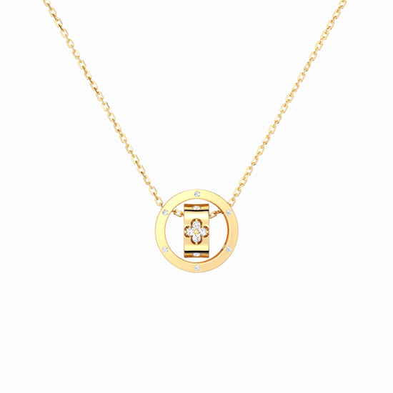 Gold necklace with a circular pendant on a white background