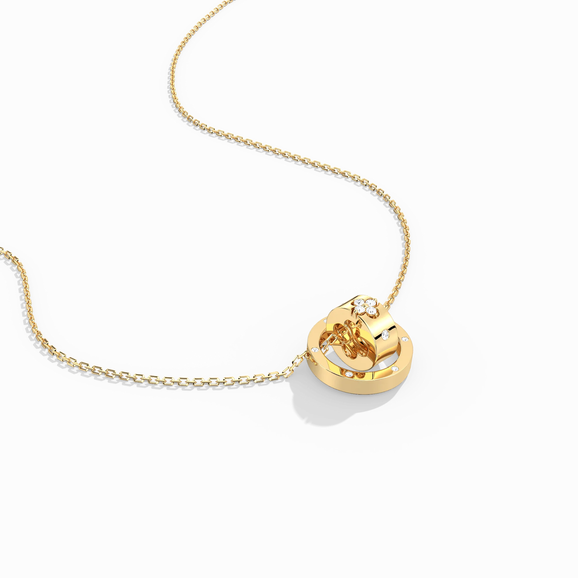 Gold necklace with a heart-shaped pendant on a white background
