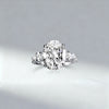 Venlis.V 3.50ct Oval Cut Diamond  Three Stone Ring with 0.70 ct Pear Cut Wings
