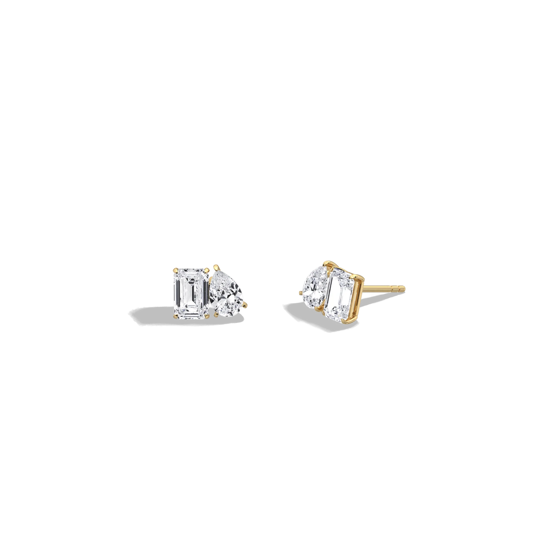 Pair of diamond stud earrings on a white background