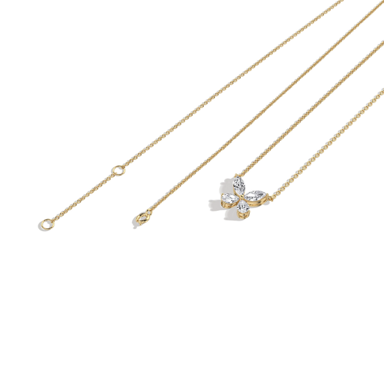 Gold necklace with a butterfly pendant on a white background