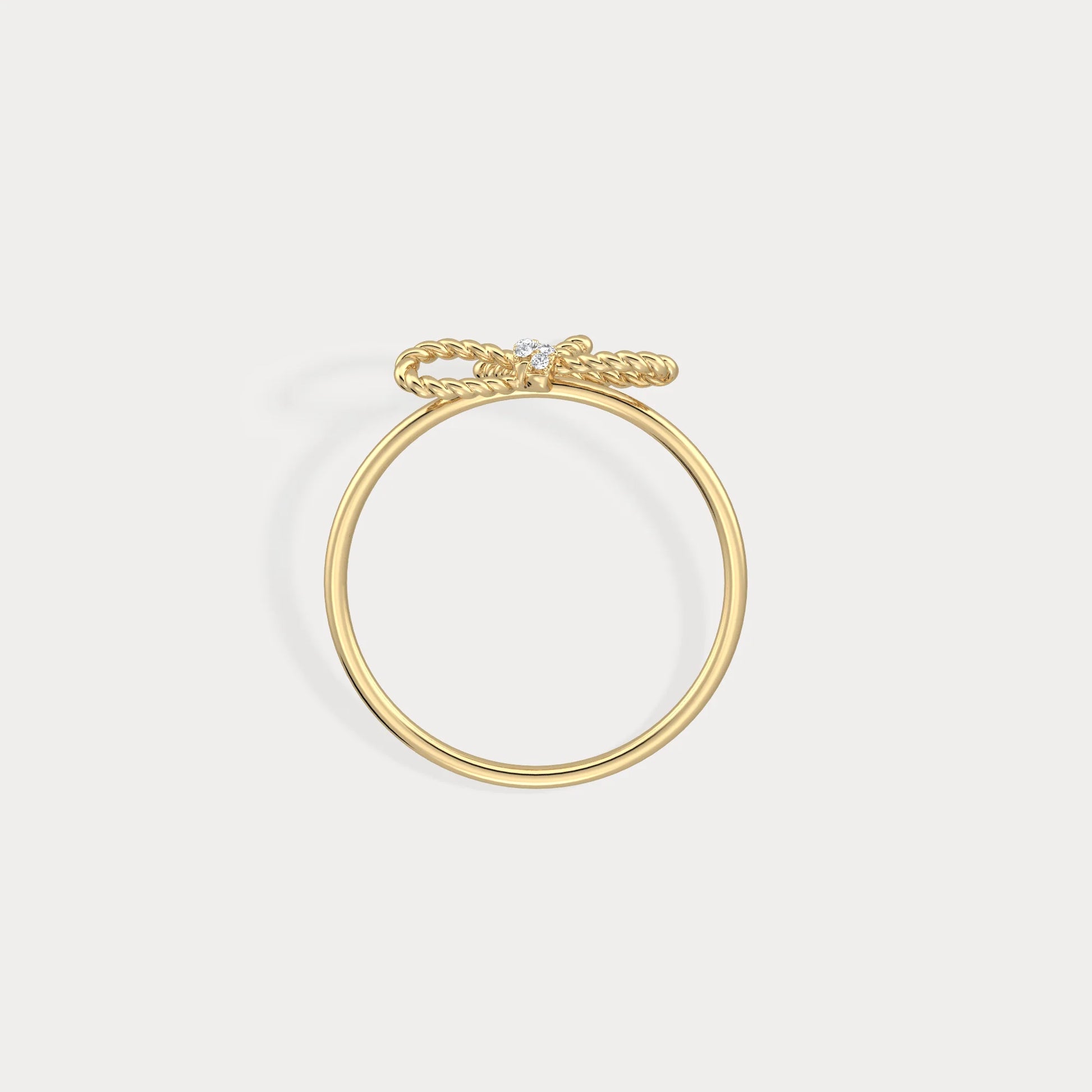 Gold bracelet on a light gray background