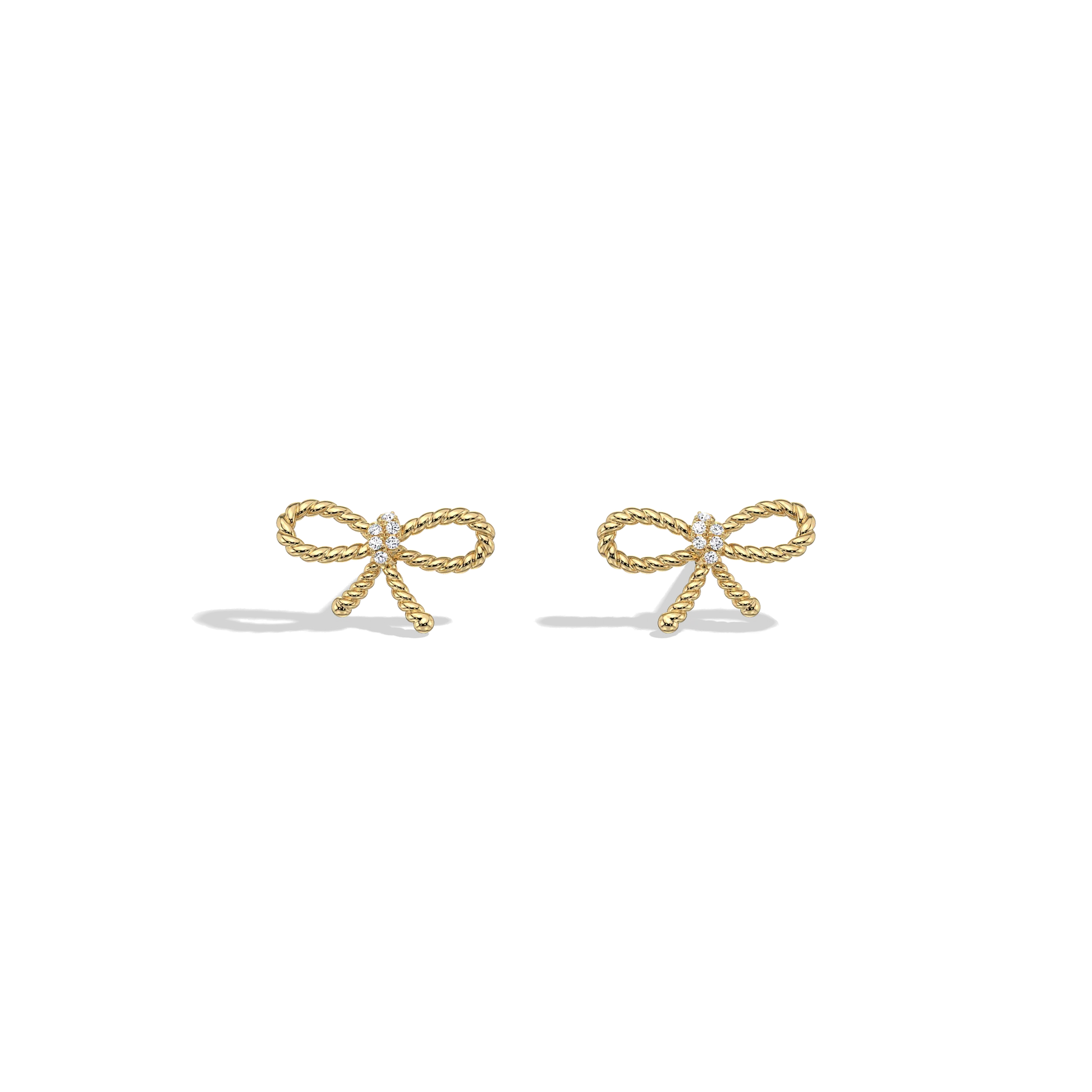 Gold bow-shaped earrings on a white background
