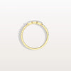 Gold ring with small diamonds on a light gray background