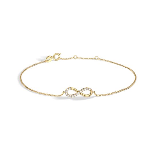 Gold bracelet with an infinity symbol on a white background